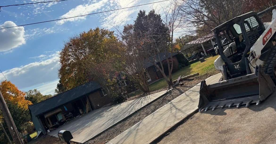 Completed Concrete Driveway Replacement installation in Charlotte, NC by Local Driveway Co — concrete contractor serving the Charlotte metro and Triangle since 2018, no deposit, no progress payments.