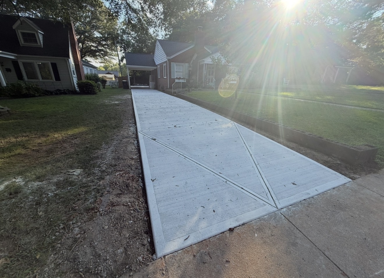 Concrete Driveways contractor in Charlotte, NC (Mecklenburg County) — Local Driveway Co delivers new driveways, driveway replacement, repair, and extensions across the Carolinas with a 30-year structural standard.
